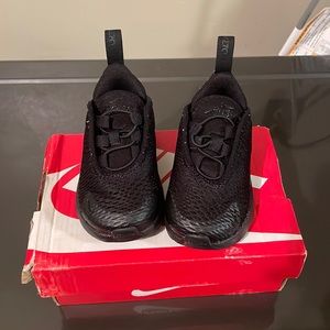 Baby Air Max size 4c. Color is Black. It is lightly used. Mint condition.